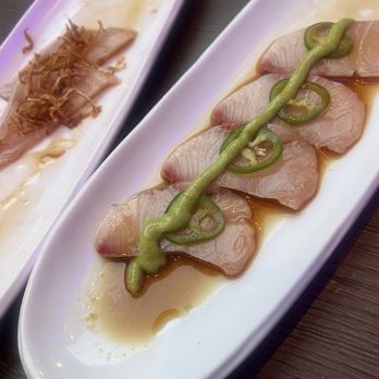Hama Sushi - Jalapeño Yellowtail sashimi with Crispy Onion Albacore in the background - Sushi Bars Near Me - Venice, California Hama Sushi - Jalapeño Yellowtail sashimi with Crispy Onion Albacore in the background - Sushi Bars Near Me - Venice, California