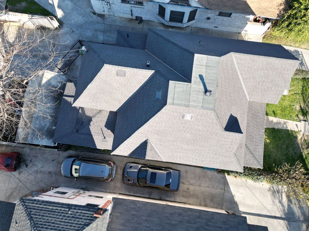 Slide of Tecun’s Roofing