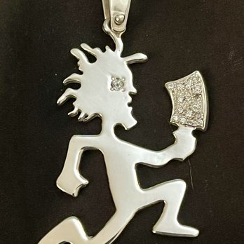 Diamond Jim's Custom Jewelry - Here's the final product after the expertly cleaned and polished my charm. - Jewelry Near Me - Madison Heights, Michigan Diamond Jim's Custom Jewelry - Here's the final product after the expertly cleaned and polished my charm. - Jewelry Near Me - Madison Heights, Michigan