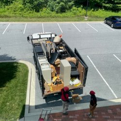 Spartan Junk Removal - excellent job packing every inch of the truck