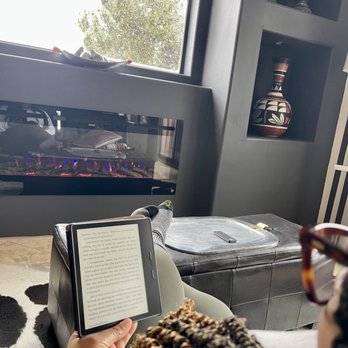 A Sunset Chateau - ...my beautiful wife reading in front of the fireplace... - Bed & Breakfast Near Me - Sedona, Arizona