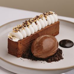 Marilena Chocolate Bar | Tonka bean Cremeux, Guanaja chocolate sorbet, fudge sauce.​
