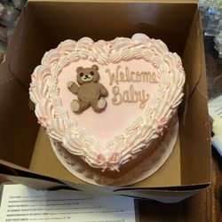 Raley's - Pink, heart-shaped Baby Shower cake with the sweetest teddy