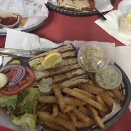 Mahi Sandwich grilled with French Fries. Really good. Mahi Sandwich grilled with French Fries. Really good.
