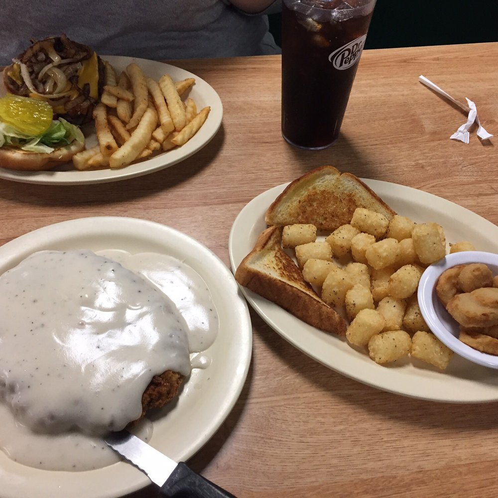Lazy Earl's Restaurant - Chicken fried steak with white gravy. Tots, toast, and fried squash (excellent!). Cheeseburger and fries in the background. - American Near Me - Clarksville, Arkansas Lazy Earl's Restaurant - Chicken fried steak with white gravy. Tots, toast, and fried squash (excellent!). Cheeseburger and fries in the background. - American Near Me - Clarksville, Arkansas