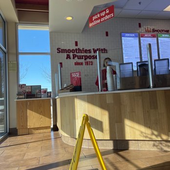 Smoothie King - a yellow caution sign in front of the counter - Juice Bars & Smoothies Near Me - College Station, Texas Smoothie King - a yellow caution sign in front of the counter - Juice Bars & Smoothies Near Me - College Station, Texas