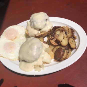 Toast - Biscuits with sausage, onions, eggs, mornay sauce, and lyonnaise potatoes substituted for the grits - Breakfast & Brunch Near Me - New Orleans, Louisiana