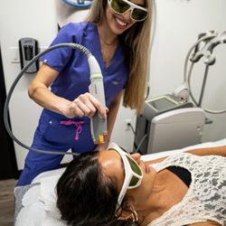 Coastal Medical Aesthetics - Nurse Alana M performing a laser