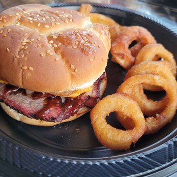Steinerhaus BBQ - Tri tip sammich... with onion rings.. at a glance it seemed small but ..it filled me and was satisfied... taste great - Barbeque Near Me - Temecula, California Steinerhaus BBQ - Tri tip sammich... with onion rings.. at a glance it seemed small but ..it filled me and was satisfied... taste great - Barbeque Near Me - Temecula, California
