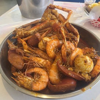 Cajun Crack'n - 1lbs snow crab legs, 1lbs head on shrimp, 1/2 sausage, 2 hard-boiled eggs. - Seafood Near Me - Stockton, California Cajun Crack'n - 1lbs snow crab legs, 1lbs head on shrimp, 1/2 sausage, 2 hard-boiled eggs. - Seafood Near Me - Stockton, California