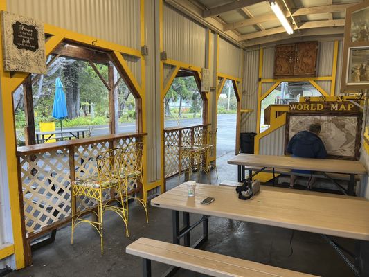 Photo of Eagles Lighthouse Cafe - Volcano, HI, US. Seating area