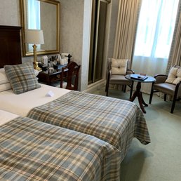 Sitting area, closet and desk with chair