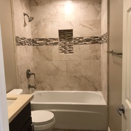 The tile on the walls are from Spain. Beautiful color and went well with the mosaic accent pieces! The tile on the walls are from Spain. Beautiful color and went well with the mosaic accent pieces!