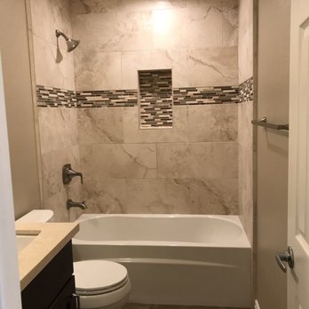 Signature Tile & Stone - The tile on the walls are from Spain. Beautiful color and went well with the mosaic accent pieces! - Flooring Near Me - Upland, California Signature Tile & Stone - The tile on the walls are from Spain. Beautiful color and went well with the mosaic accent pieces! - Flooring Near Me - Upland, California
