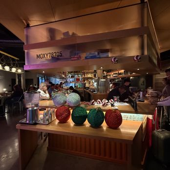 Moxy Austin - University - Check in bar. - Hotels Near Me - Austin, Texas