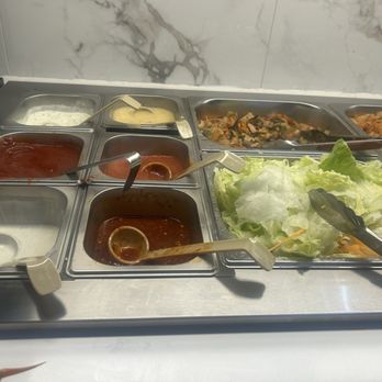 Ocean Buffet - Condiments with no labels and salad and kimchi - Buffets Near Me - Carlsbad, California Ocean Buffet - Condiments with no labels and salad and kimchi - Buffets Near Me - Carlsbad, California