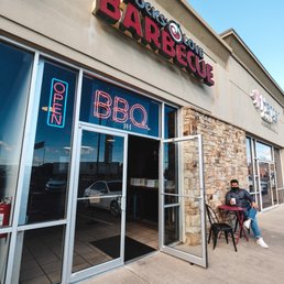 Exterior outside entrance of Socks Love Barbecue - Front of restaurant - Cumming, Georgia Exterior outside entrance of Socks Love Barbecue - Front of restaurant - Cumming, Georgia
