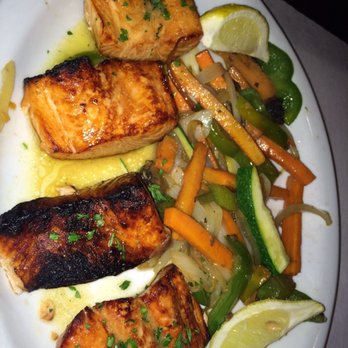 New Reza's Restaurant - Salmon dish, as you can see burnt and veggies were served from buffet yuk! - Buffets Near Me - Oak Brook, Illinois New Reza's Restaurant - Salmon dish, as you can see burnt and veggies were served from buffet yuk! - Buffets Near Me - Oak Brook, Illinois