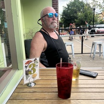 Terrebonne Po'boys - Waiting on the patio, watching the world go by. - Cajun/Creole Near Me - Lawrence, Kansas