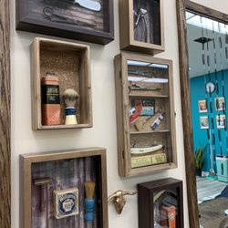 The Edgebrook Parlor - Shadow boxes with old barber products