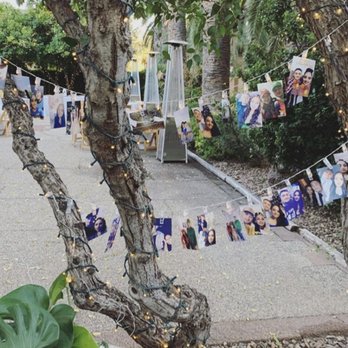 Kingan Gardens - Strings of lights with pics of my daughter and her husband - Venues & Event Spaces Near Me - Tucson, Arizona