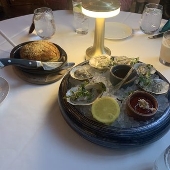 Redeye Grill - Oysters on the Half Shell and Garlic Bread - New American Near Me - New York, New York Redeye Grill - Oysters on the Half Shell and Garlic Bread - New American Near Me - New York, New York