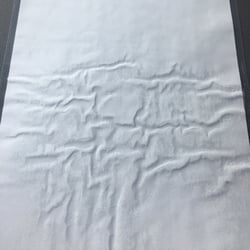 FedEx Office Print & Ship Center - Wrinkled piece of shit lamination x3.