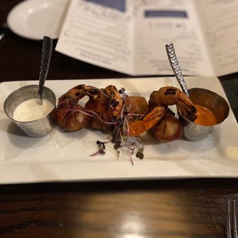 Twisted Tree - a plate of food on a table - Seafood Near Me - Saint Louis, Missouri Twisted Tree - a plate of food on a table - Seafood Near Me - Saint Louis, Missouri