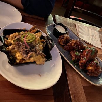 Von's 1000Spirits - Damn Good Wings, Pork Confit Fries - New American Near Me - Seattle, Washington Von's 1000Spirits - Damn Good Wings, Pork Confit Fries - New American Near Me - Seattle, Washington