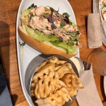 Tap & Barrel - Bridges - Lobster roll sandwich with truffle waffle fries - Breakfast & Brunch Near Me - Vancouver, British Columbia Tap & Barrel - Bridges - Lobster roll sandwich with truffle waffle fries - Breakfast & Brunch Near Me - Vancouver, British Columbia