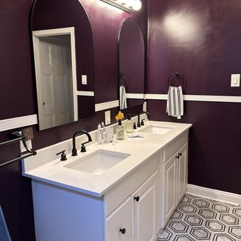 Sleek Renovations - a bathroom with purple walls - General Contractors Near Me Sleek Renovations - a bathroom with purple walls - General Contractors Near Me