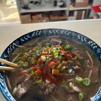 Pho Bac Ky - Rare steak pho with siracha and hoisin. - Vietnamese Near Me - Tustin, California Pho Bac Ky - Rare steak pho with siracha and hoisin. - Vietnamese Near Me - Tustin, California