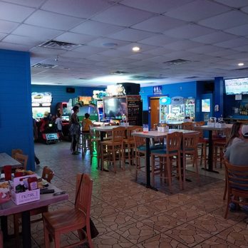 Eddie's Bar & Grill - Dining area and game area - Sports Bars Near Me - Dunedin, Florida Eddie's Bar & Grill - Dining area and game area - Sports Bars Near Me - Dunedin, Florida
