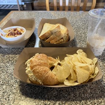 Generations Coffee & Sandwich Shop - a croissant sandwich and chips - Sandwiches Near Me - Liberty, Texas
