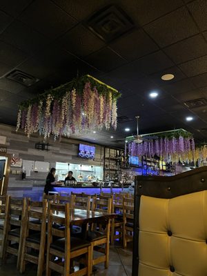 Modern taqueria interior with industrial-chic design and open kitchen