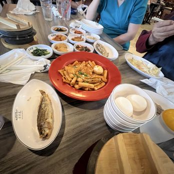 Tofu Village - #8-1 Spicy Rice Cake with Banchan in the background - Korean Near Me - Houston, Texas