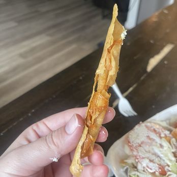 Bonanza Tortilleria - This is a rolled fried chicken taco. Literally one little piece of chicken inside and so crunchy - Imported Food Near Me - Modesto, California Bonanza Tortilleria - This is a rolled fried chicken taco. Literally one little piece of chicken inside and so crunchy - Imported Food Near Me - Modesto, California