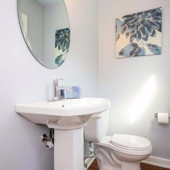 Hileman Construction Company - a bathroom with a toilet and sink - General Contractors Near Me - Ann Arbor, Michigan Hileman Construction Company - a bathroom with a toilet and sink - General Contractors Near Me - Ann Arbor, Michigan