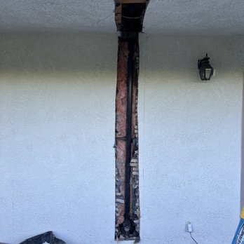 Sal's Plumbing - Beach Cities - Exterior stucco wall and overhang opened for access to kitchen drainage pipes. - Plumbing Near Me - Redondo Beach, California Sal's Plumbing - Beach Cities - Exterior stucco wall and overhang opened for access to kitchen drainage pipes. - Plumbing Near Me - Redondo Beach, California