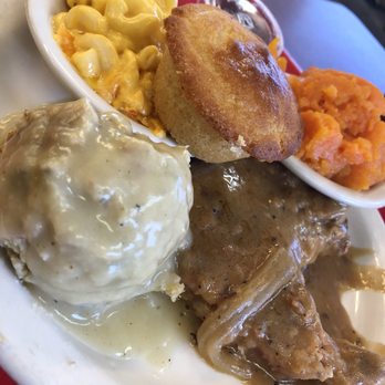 Kountry Cookin' - Smothered pork chop, stuffing with gravy (so good), yams, mac n cheese, and corn bread. - New American Near Me - Memphis, Tennessee Kountry Cookin' - Smothered pork chop, stuffing with gravy (so good), yams, mac n cheese, and corn bread. - New American Near Me - Memphis, Tennessee