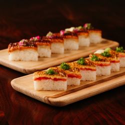 Marilena Cafe & Raw Bar - Aburi Sockeye Salmon | Wild salmon, serrano chili, black pepper.​

Aburi Sablefish | Miso marinated sablefish, red chili. ​