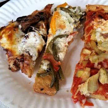 The Placid Baker - L to R, Caramelized onion & mushroom; Garlic scapes, tomato & goat cheese; Roasted red pepper & artichoke. - Bakeries Near Me - Troy, New York