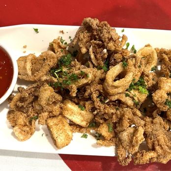 De Luca's Restaurant - Calamari Fritti with marinara sauce - Italian Near Me - Whittier, California De Luca's Restaurant - Calamari Fritti with marinara sauce - Italian Near Me - Whittier, California