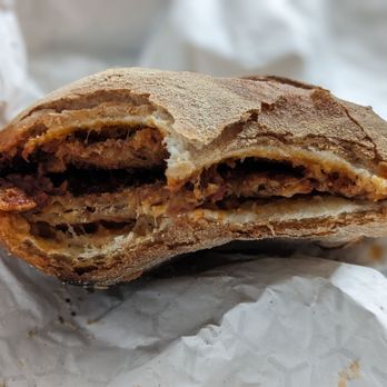 The Parm House - Cross-section of my veal sandwich - Italian Near Me - Hamilton, Ontario The Parm House - Cross-section of my veal sandwich - Italian Near Me - Hamilton, Ontario