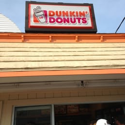 dunkin donuts sign above the entrance dunkin donuts sign above the entrance