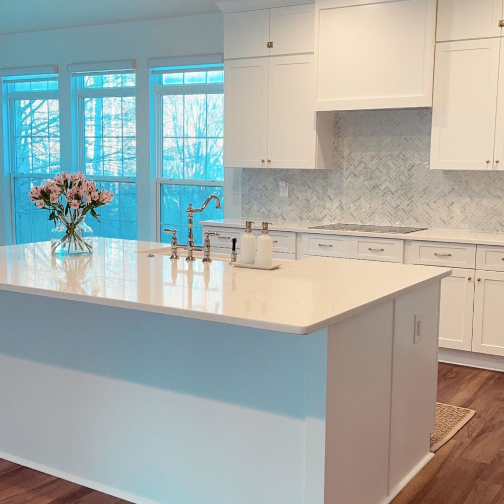 A&G Construction Services - a kitchen with a center island - General Contractors Near Me A&G Construction Services - a kitchen with a center island - General Contractors Near Me