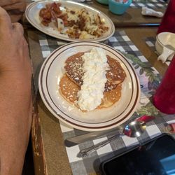 A friend had pancakes and bacon and eggs