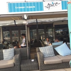 Beachclub Spice - Indoor and outdoor seating leading to the sand.
