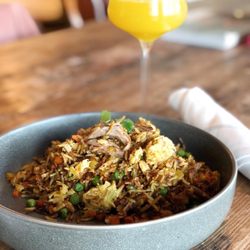 Beso Bar & Bottle - Our house duck confit fried rice with ginger, lemongrass, and soy