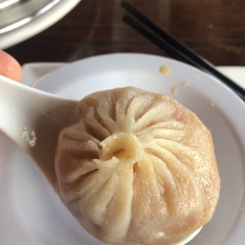 Tom's Dim Sum - Here is how you eat a pork soup dumpling-- ladle and chop sticks - Dim Sum Near Me - Media, Pennsylvania Tom's Dim Sum - Here is how you eat a pork soup dumpling-- ladle and chop sticks - Dim Sum Near Me - Media, Pennsylvania
